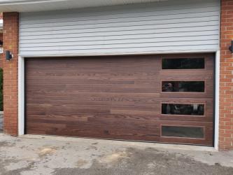 Dark Oak plank contemporary with obscure windows down the right side